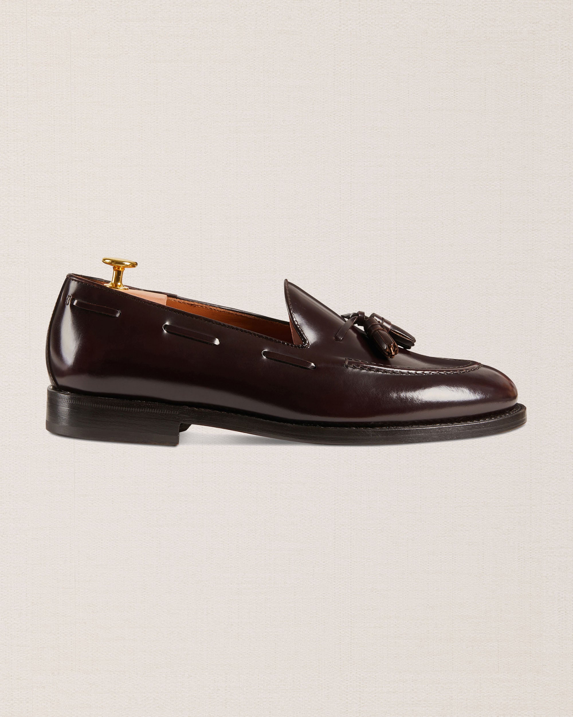 Tapered blu College Penny Loafers with tassels in leather for men
